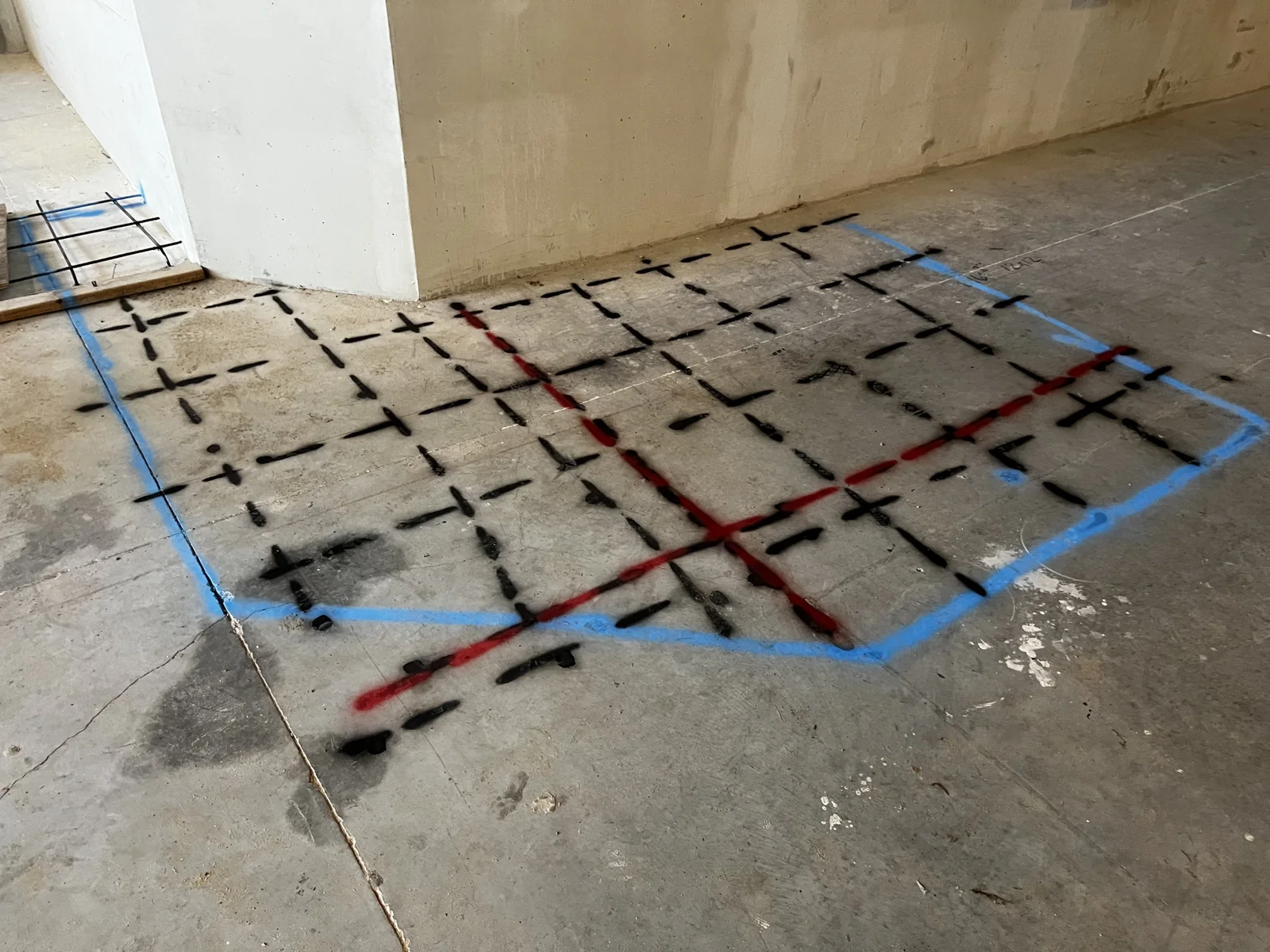 Actual ScanXConcrete job-site photograph showing marked concrete